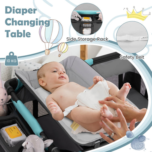 The green foldable pack and play showing the diaper changing table attachment with a baby on it
