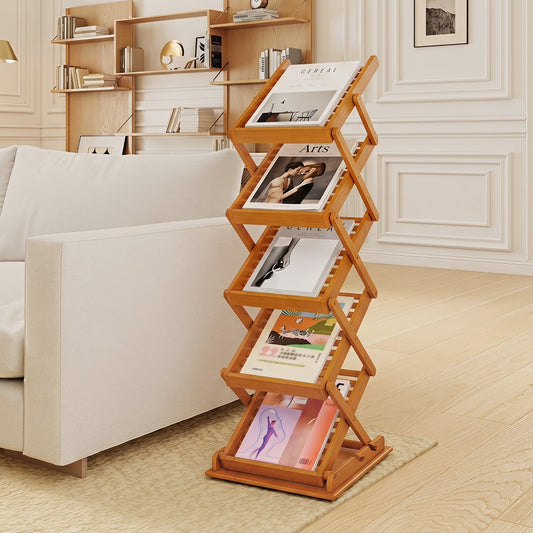 The bamboo magazine rack is shown in a living room setting next to a sofa