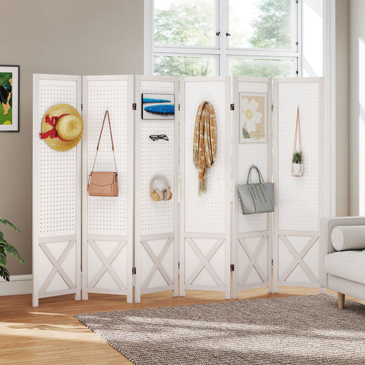 The room divider is used to display hats, bags, and scarves in a living room setting