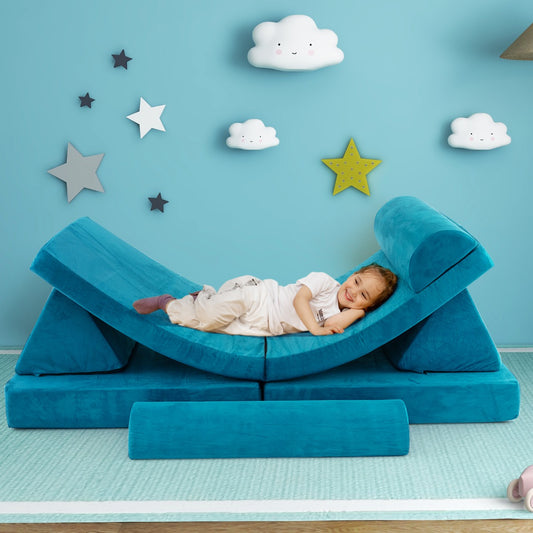A child relaxing on the green modular kids seating in a playful room setting