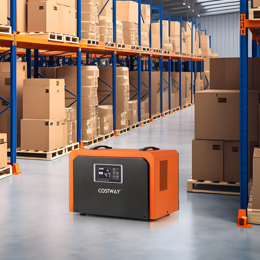 Orange crawl space dehumidifier in a warehouse setting with stacked boxes
