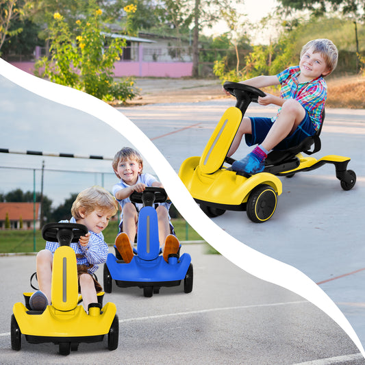 Two children riding the kids electric cars in yellow and blue on an outdoor paved playground