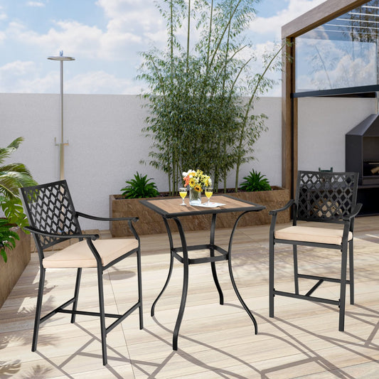 The patio bar table is shown with two bar stools on a paved patio area