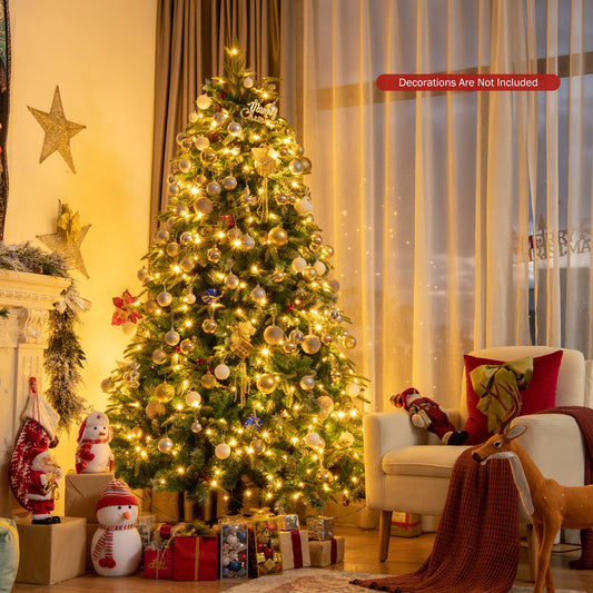 the Christmas tree decorated and lit in a cosy room setting with presents underneath