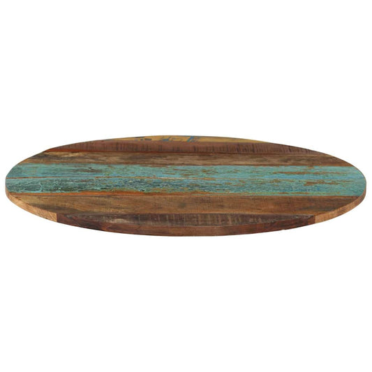 The round table top seen from the side, showing its thickness and rustic wood grain