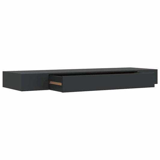 The wall shelf with the drawer pulled out to show the internal storage space