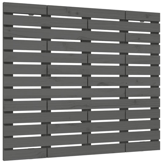 The grey wooden slatted wall headboard shown flat against a wall
