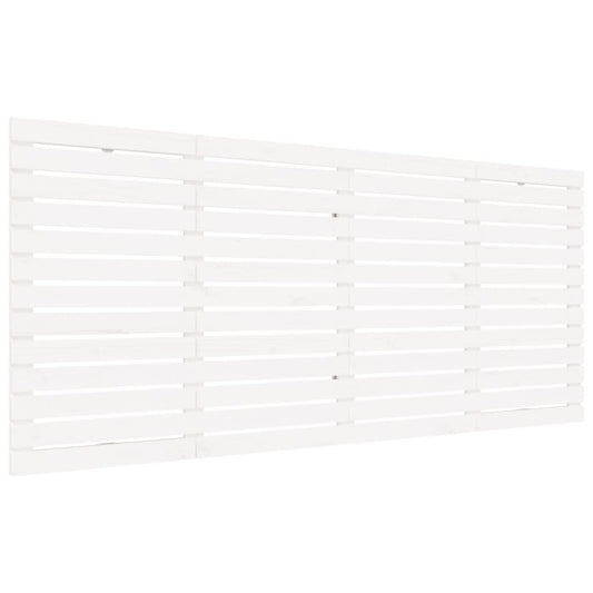 The white slatted wooden headboard shown from the side
