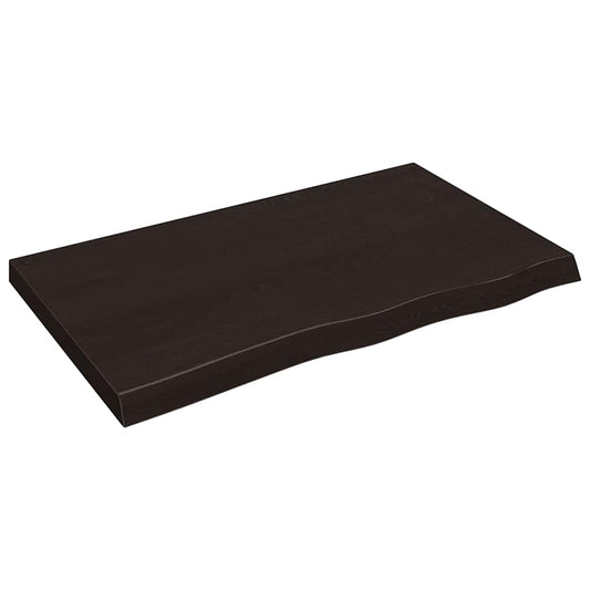 Dark brown treated solid wood oak table top with a wavy edge
