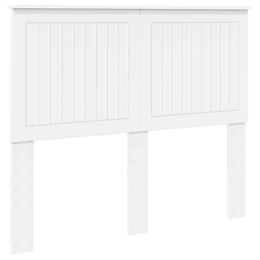 The white engineered wood headboard standing against a plain background