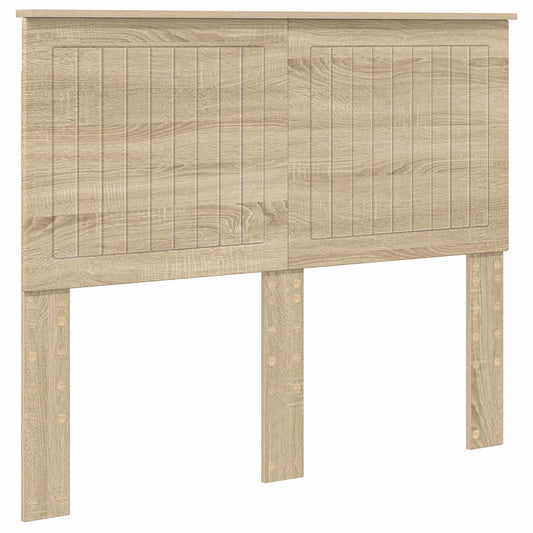Sonoma oak headboard with a textured panel design and two support legs