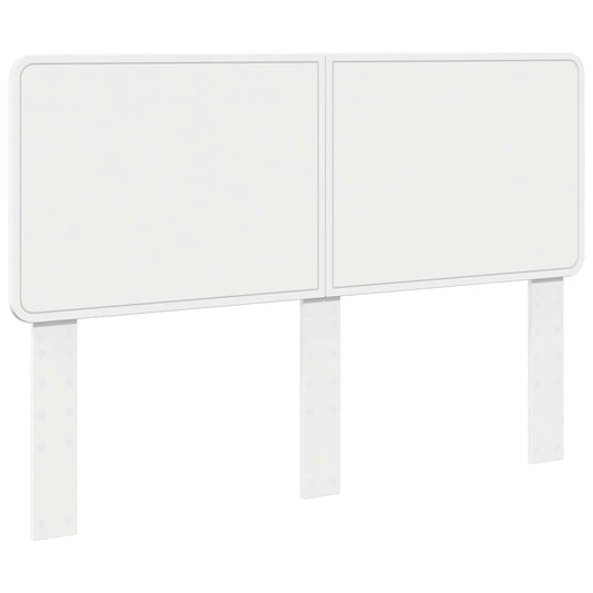 The white headboard shown from a high angle with its three vertical mounting legs