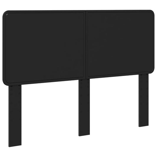 The black engineered wood headboard with two support legs