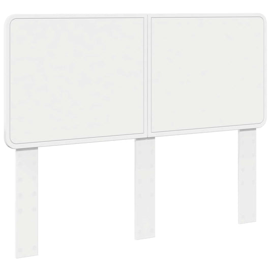 The white engineered wood headboard, showing its two upright legs and panel design