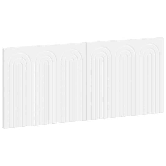 White engineered wood headboard with a decorative arched pattern