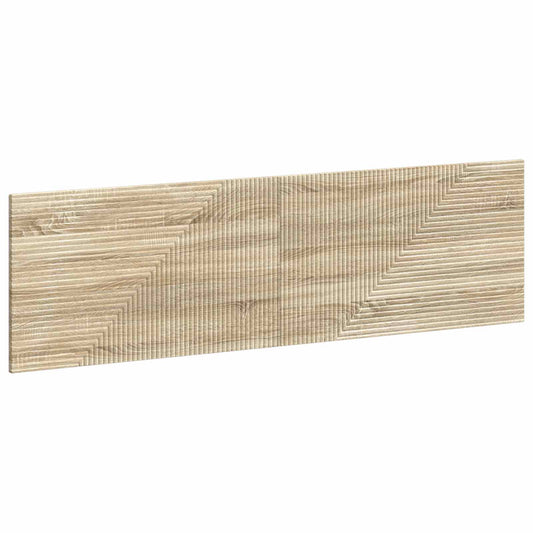 Close-up of the textured front panel of the wooden headboard
