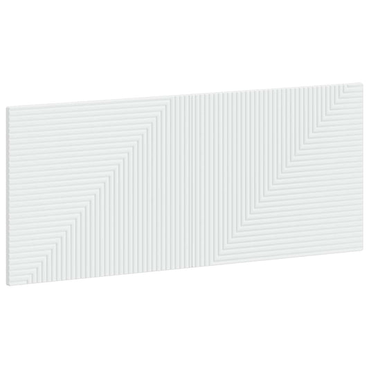 The white engineered wood headboard with a geometric ribbed pattern