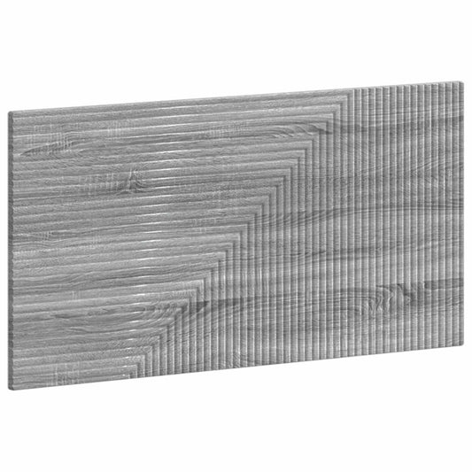 Close-up of the textured grey sonoma engineered wood pattern on the headboard