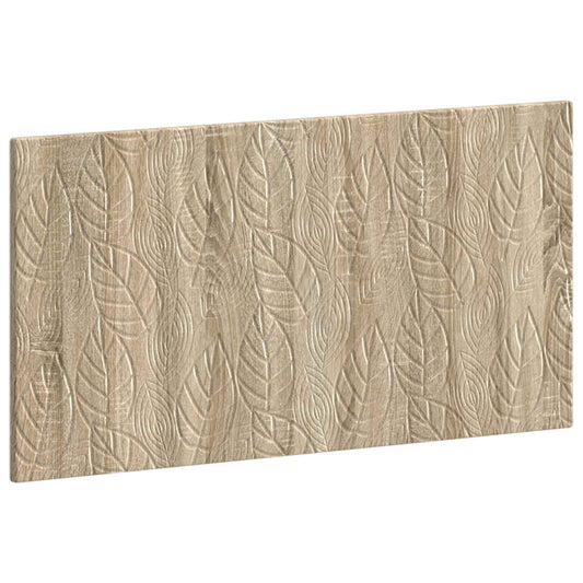 Close-up of the leaf pattern on the sonoma oak engineered wood headboard