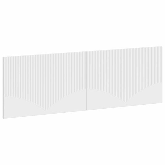 The white engineered wood headboard with a ribbed vertical pattern and curved detail
