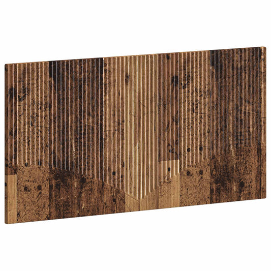 The wall-mounted headboard with a distressed wood effect finish