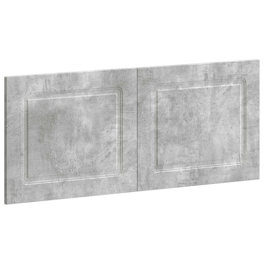 The wall-mounted headboard shown from a high angle to display its concrete grey finish