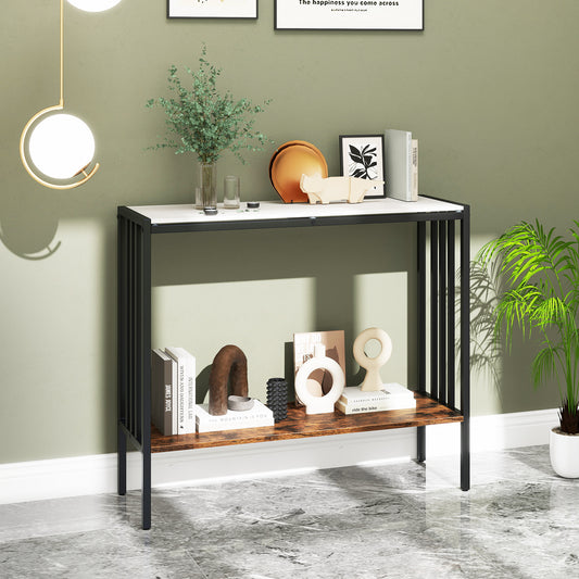 The console table in a living room with decorative items on top
