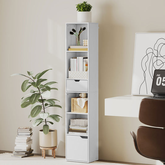 The tall narrow bookshelf is shown in a room with a desk and plant