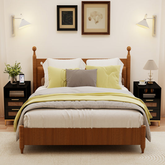 Two black narrow end tables either side of a wooden bed