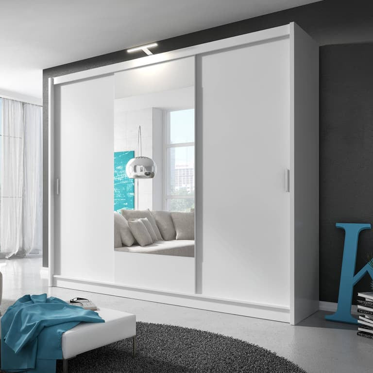 Modern living room with a white wardrobe and gray sofa