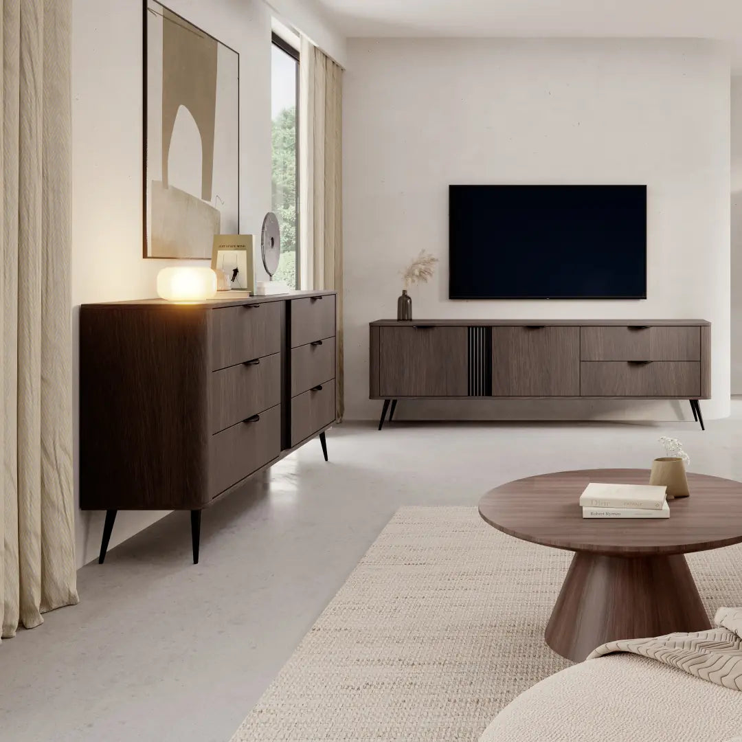 Modern living room with wooden furniture and a television.