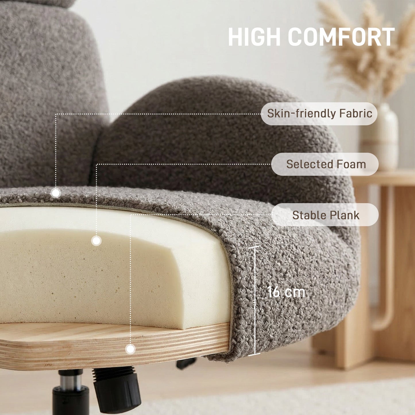 Close-up of the grey fabric armchair's construction and materials