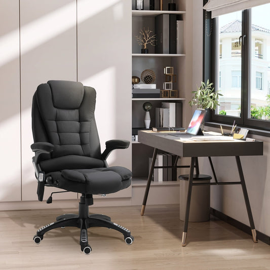 The black fabric office chair is shown in a home office setting next to a desk
