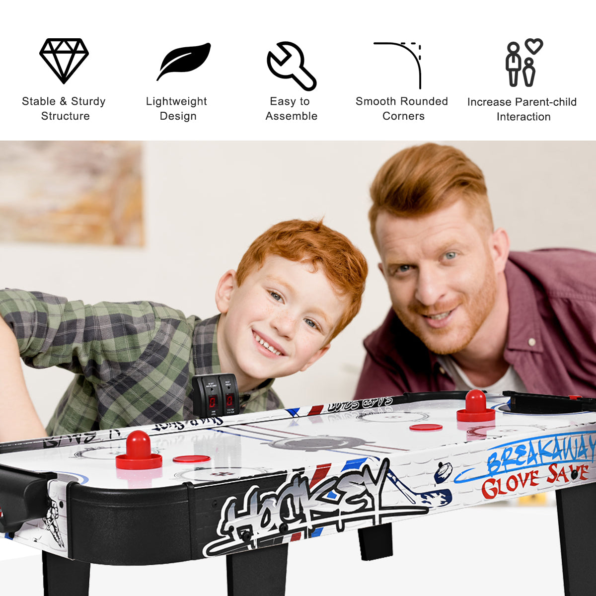 Close up of the air powered hockey table with two children smiling