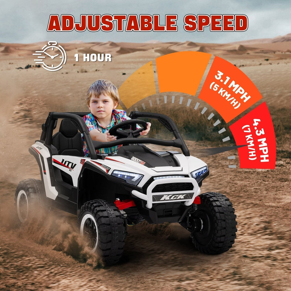 A boy driving the white kids electric buggy, with speed indicators and playtime