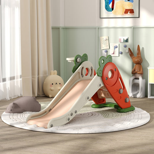 The carrot themed toddler slide placed on a round rug inside a bright nursery room