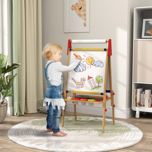 A young child drawing on the whiteboard of the wooden kids easel in a bright room