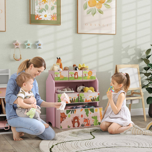 A mother and two children interacting with the pink toy storage unit in a nursery