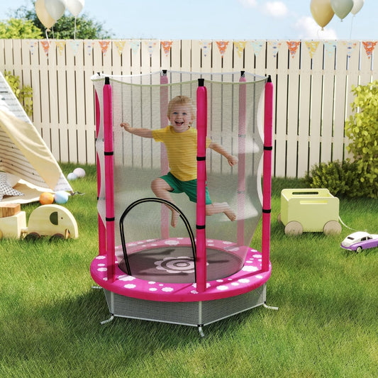 The toddler trampoline set up on a lawn with a happy child jumping inside the enclosure