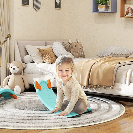 A light blue kids balance board in a child's bedroom, with a young girl sitting on it