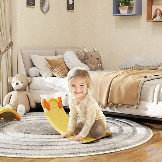 The kids balance board in a child's bedroom with a young girl sitting on it