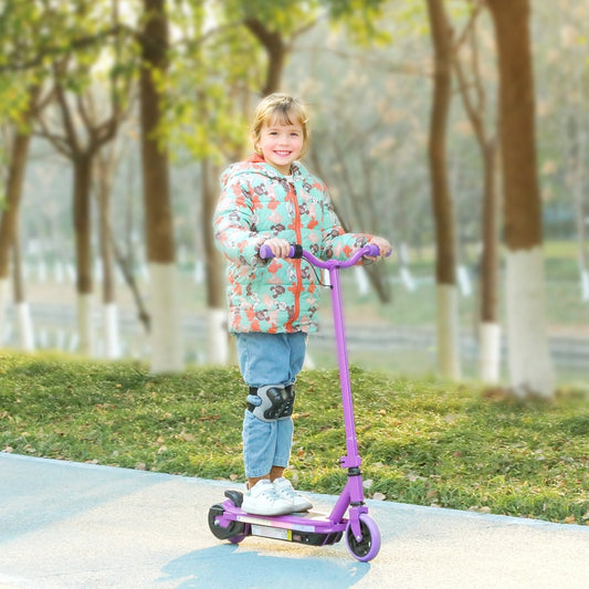 A young girl rides the purple kids electric scooter outdoors on a paved path