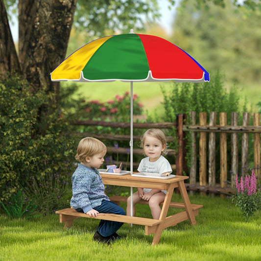 Two children sitting on the wooden benches of the kids picnic table in a garden setting