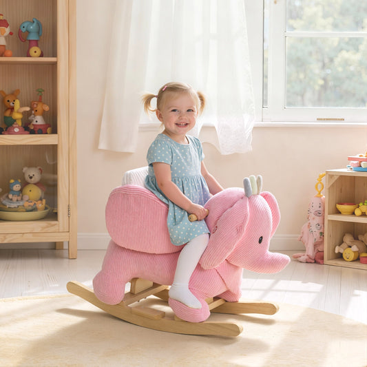A young girl sitting on the pink elephant rocking animal in a bright living room
