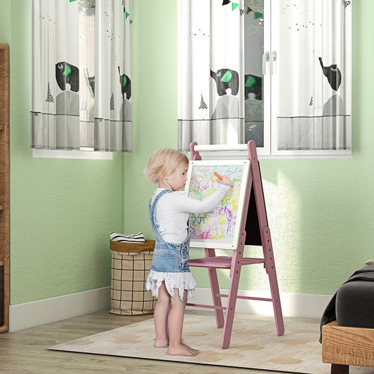 A young child drawing on the pink art easel in a brightly lit room