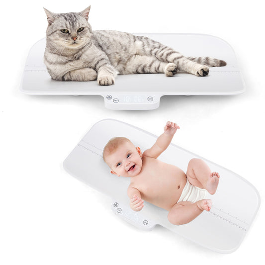 The infant scale with a cat lying on the tray and a baby on the tray