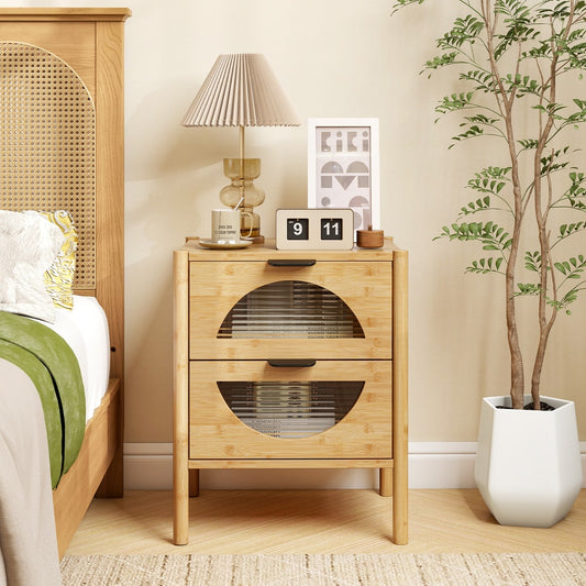 The bamboo bedside table is shown next to a bed in a bedroom setting
