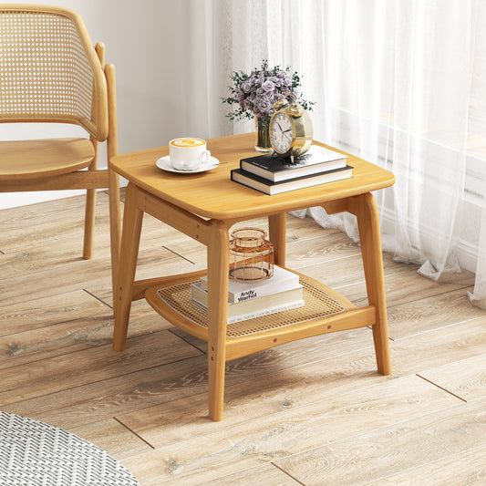 The bamboo side table in a living room setting with a chair and rug