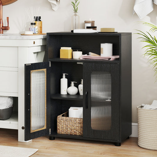 The black floor cabinet with one door open showing toiletries and a basket inside
