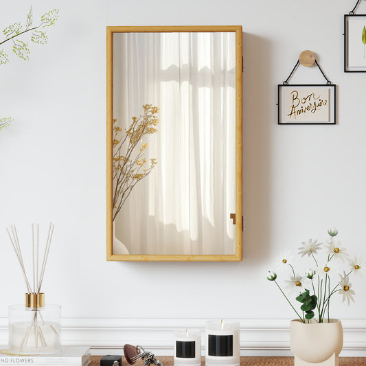 The wall cabinet mounted on a white wall above a table with candles and flowers